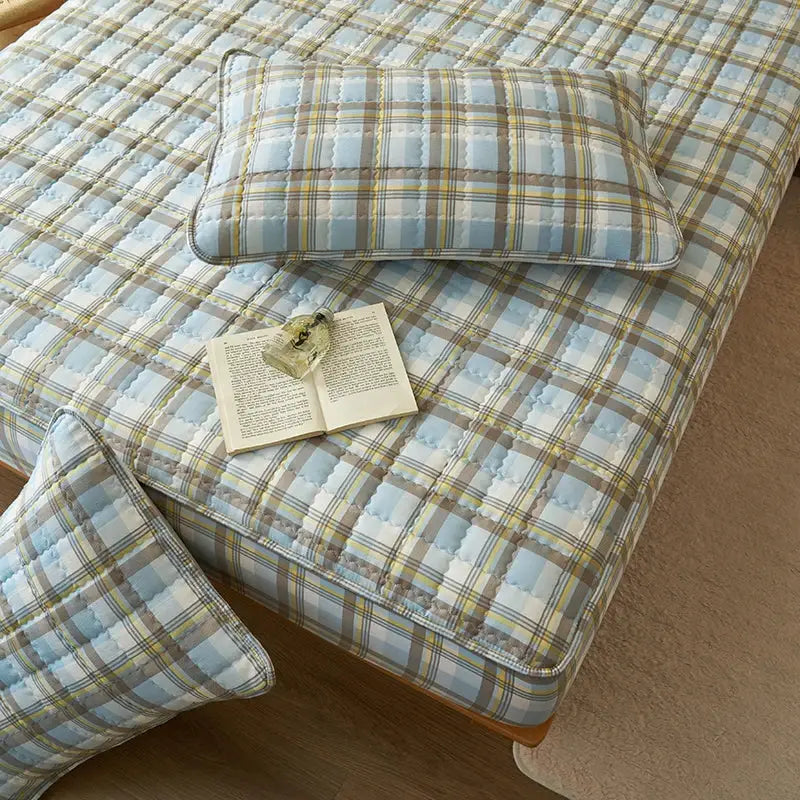 Simples Market quilted plaid mattress cover protector in light blue, antibacterial and breathable for fresh sleep.