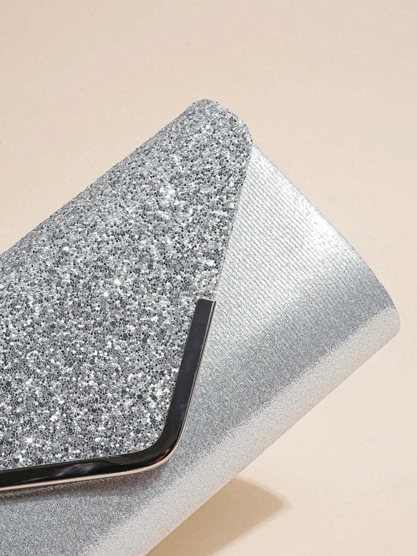 Women’s silver sequin envelope clutch with metallic frame for party wear