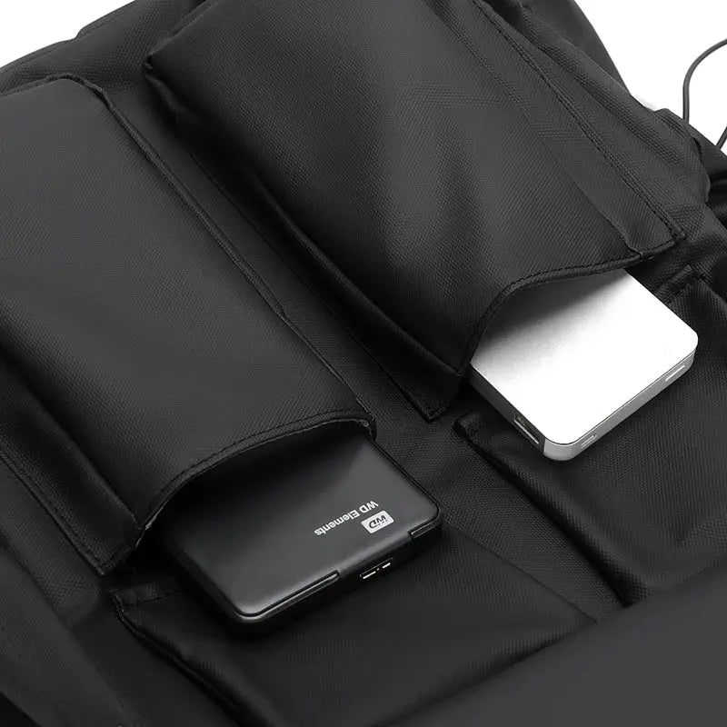 Simples Market luxury men's backpack; black, high-capacity 15.6-inch laptop bag with side pockets for power banks
