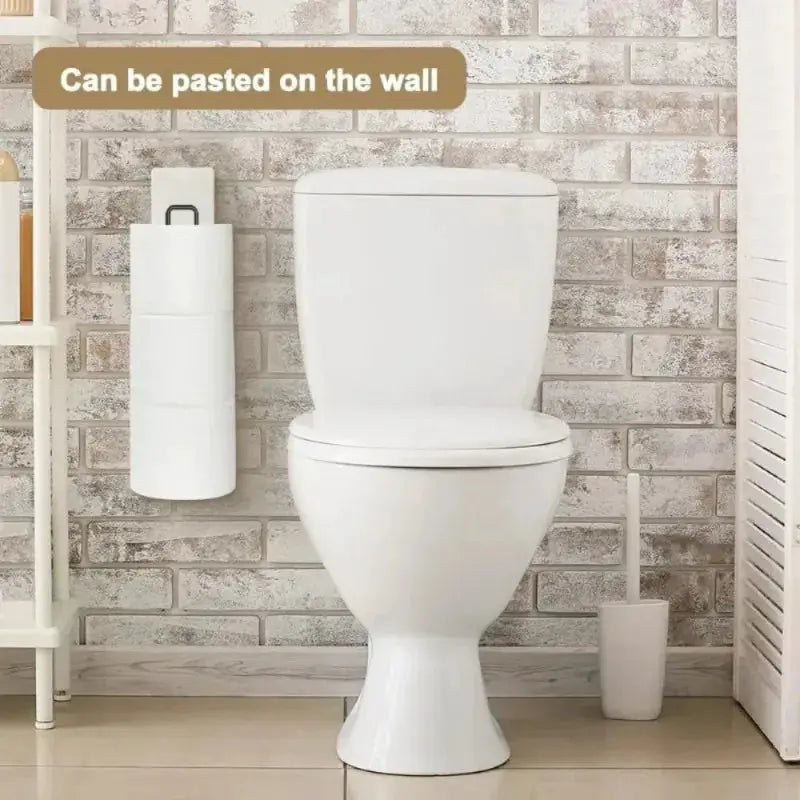 Self-adhesive toilet paper holder with towel bar wall mount beside a toilet