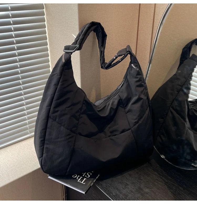 Trendy women's soft-cloth shoulder bag in black, large hobo-style tote with dual top handles