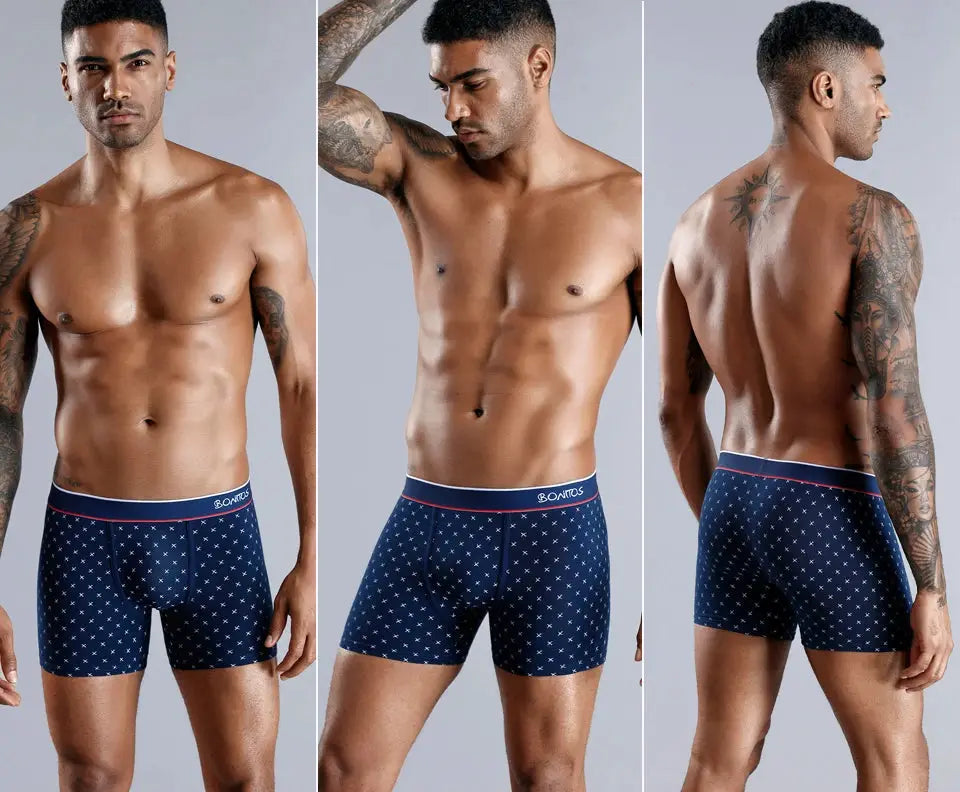 Men's navy blue cotton print boxers with white star pattern and red-trim waistband branded Bonitos