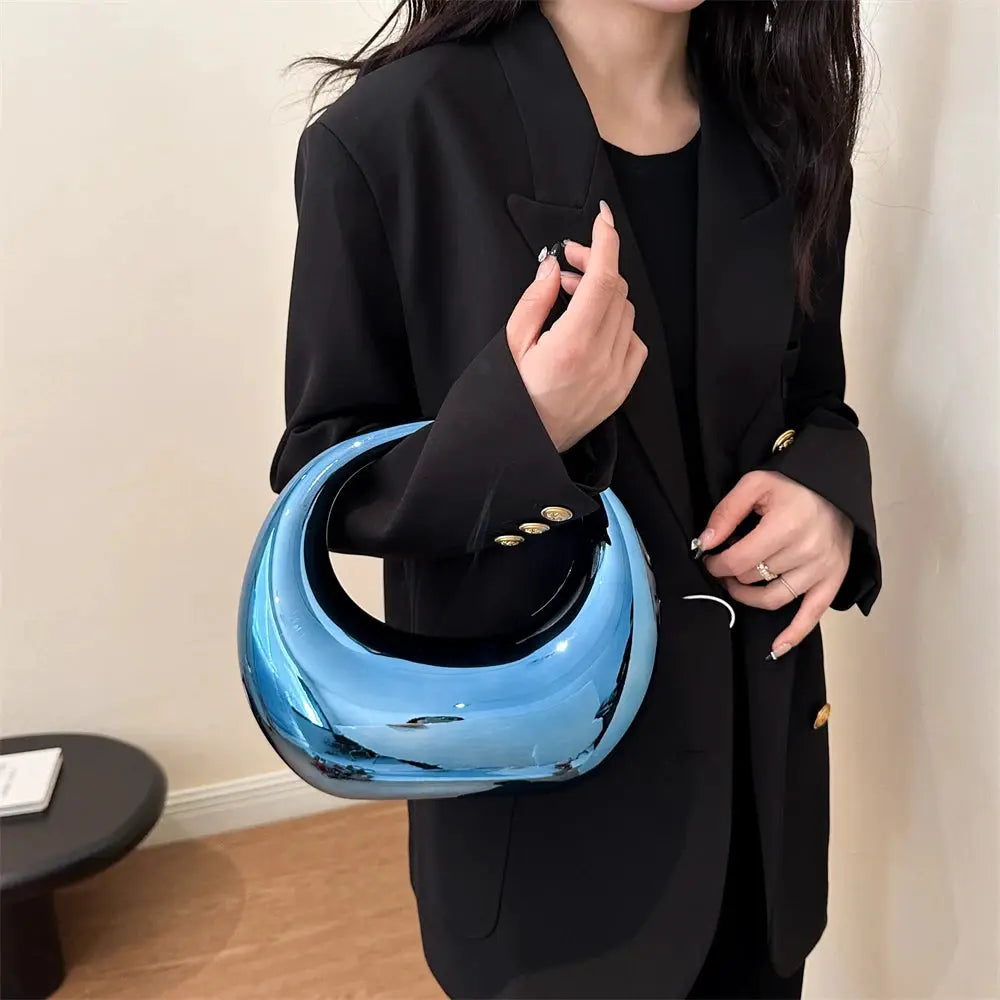 MOODS blue PVC round-handle evening handbag with wrist strap
