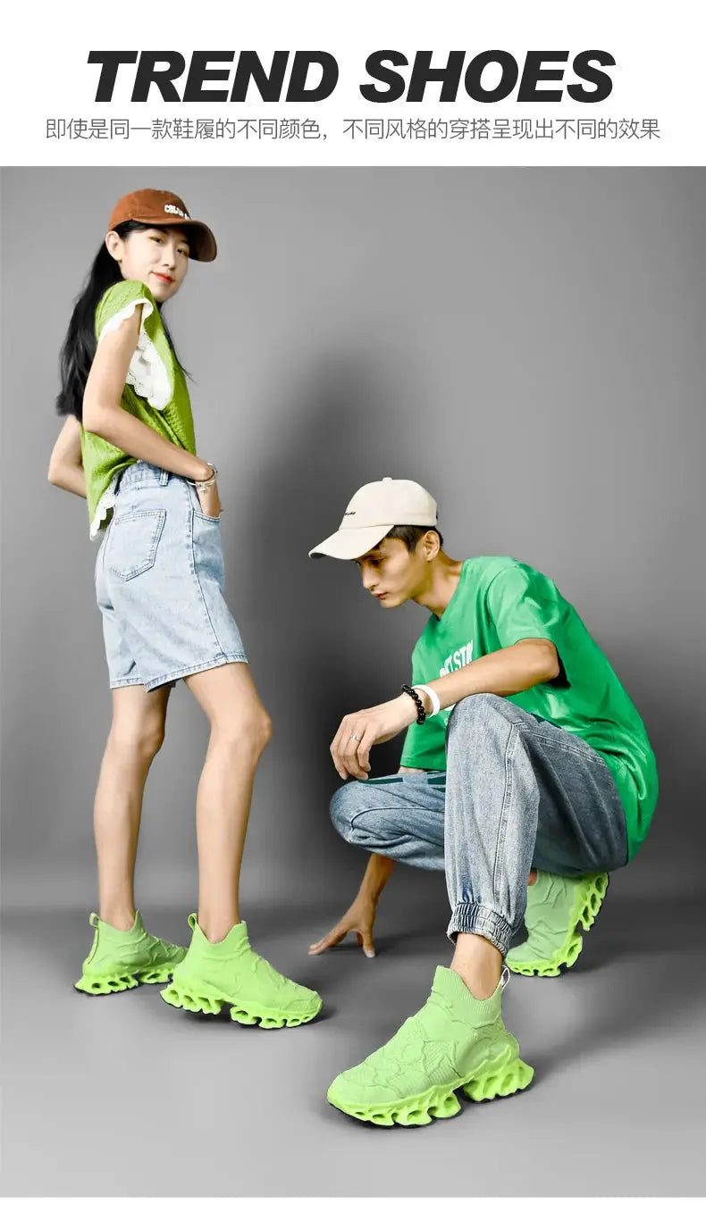 Sneakers in neon lime green with chunky wavy outsole, two pairs worn by a man and a woman in casual streetwear.