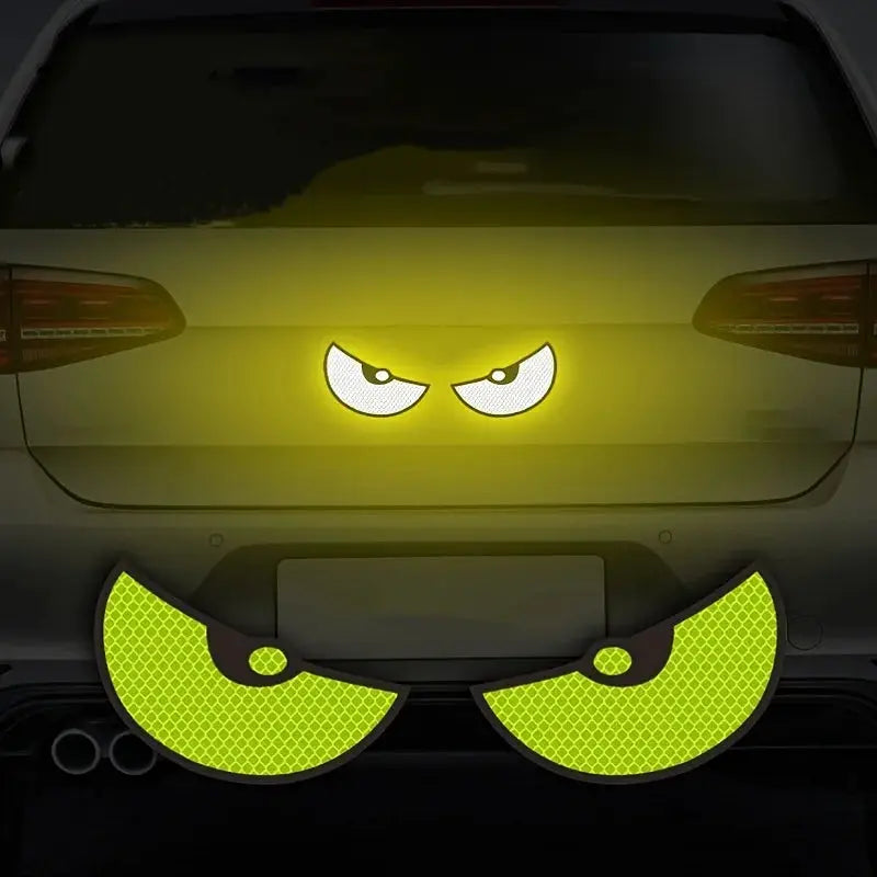 Simples Market 2pc reflective devil-eye car stickers, bright yellow-green curved bumper accents.