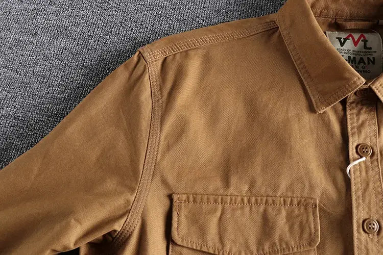 Men's khaki work shirt by Simples Market with chest pocket and button-front