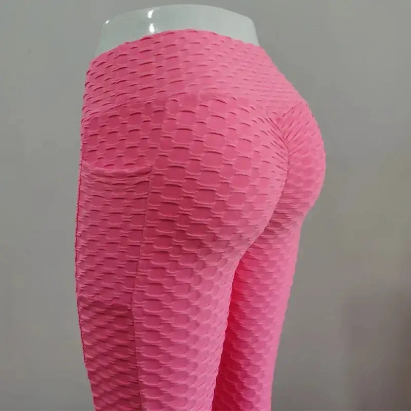 Women's pink bubble-textured pocket leggings, high-waist, stretchy gym pants