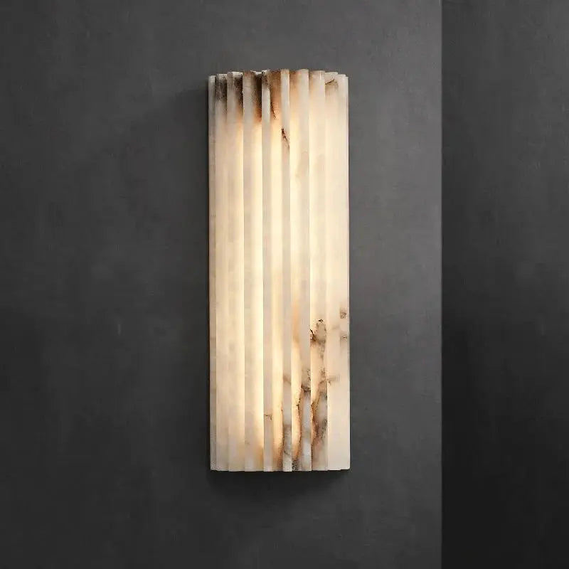 Marble wall lamp with vertical slats; warm glow bedside sconce by Simples Market