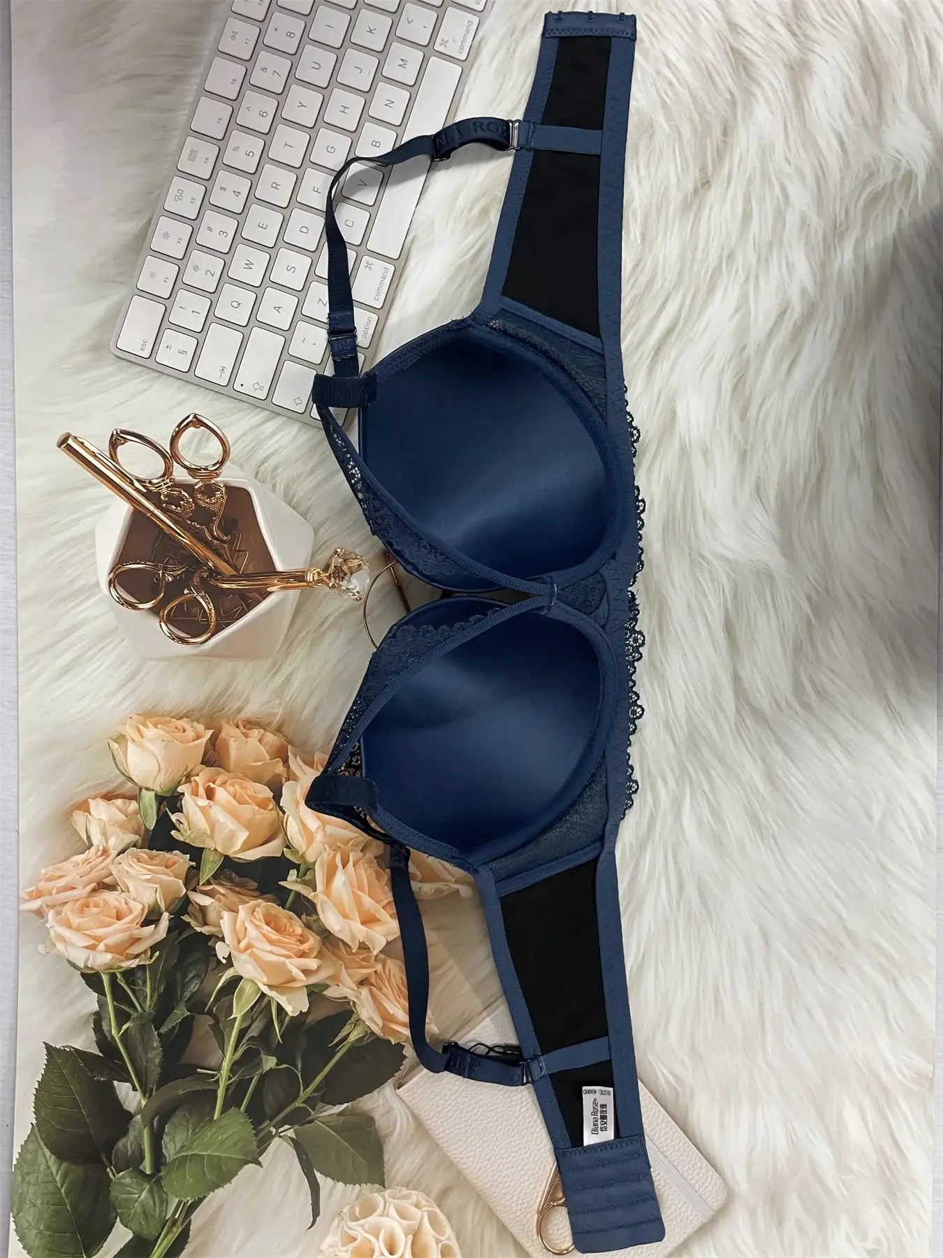 Blue underwire molded-cup bra by Simples Market with lace trim and adjustable straps