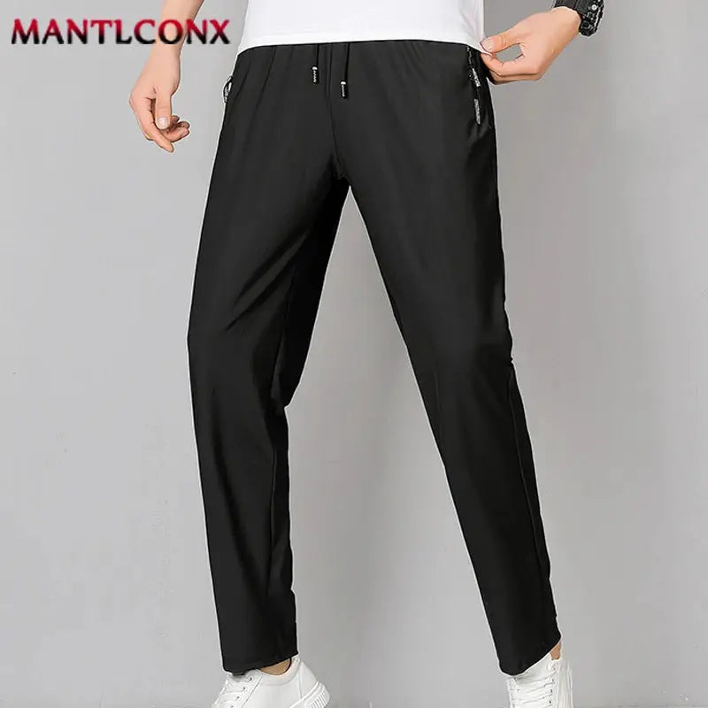 Men's black breathable quick-dry jogger pants with elastic waist and zip pockets, Mantlconx/Simples Market