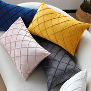 Set of five 30x50 rectangular pillow covers in blue, pink, yellow, gray and white with a grid quilted pattern