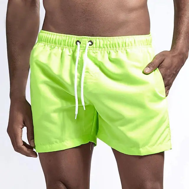 Men's neon lime swim shorts with white drawstring, quick-dry fabric and side pockets - Simples Market