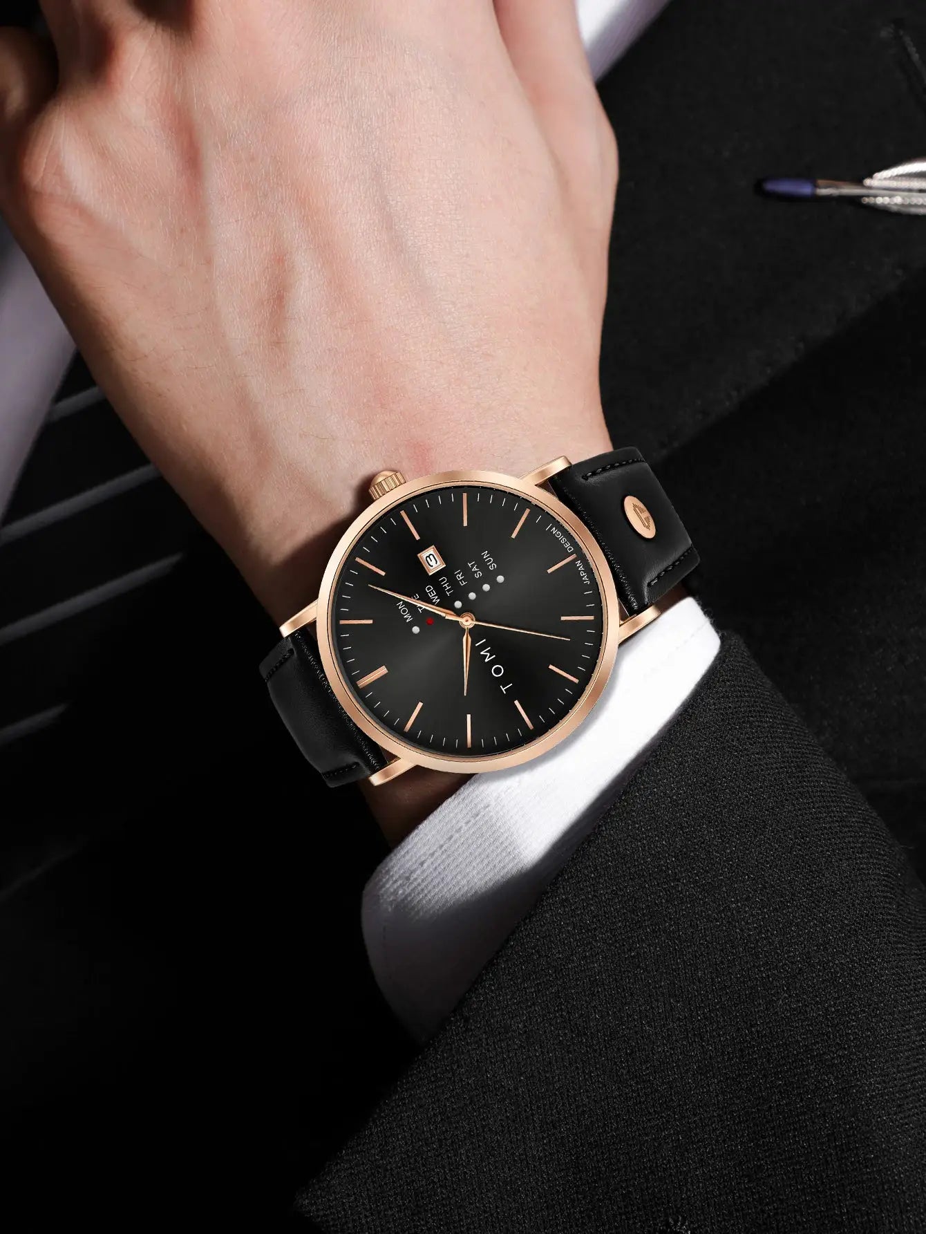 TOMI Trendy men's watch with rose-gold case, textured black dial, black leather strap, weekday calendar
