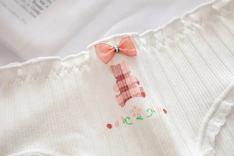 Cotton women's panties with pink bow, white lace trim, floral print, mid-waist brief