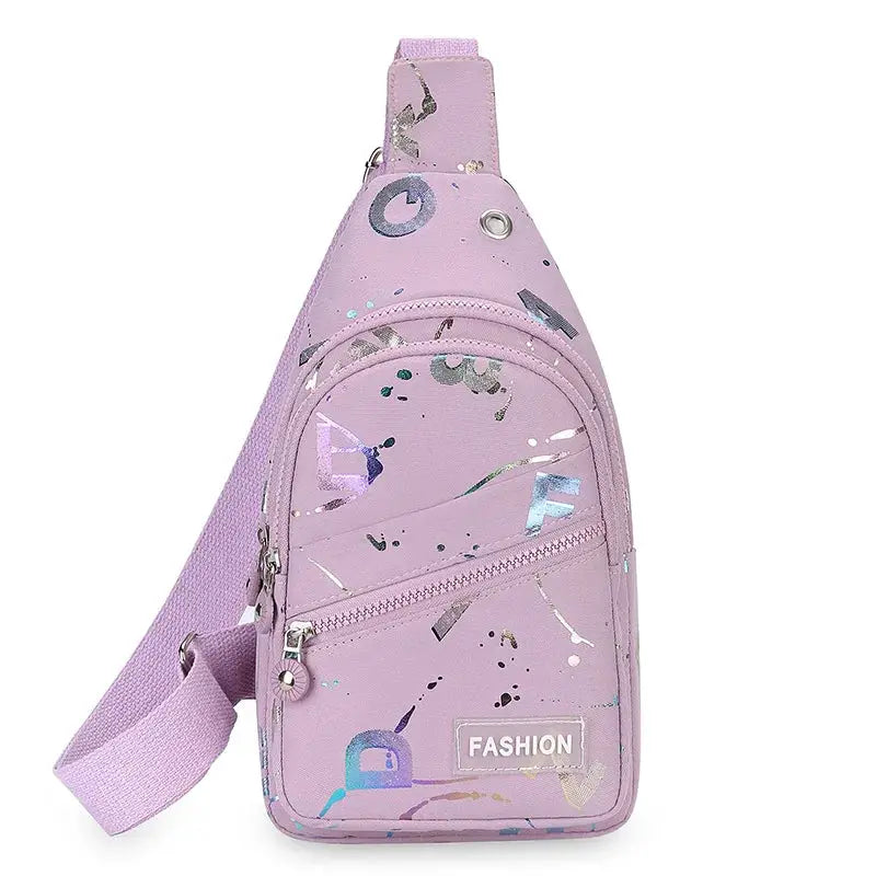 Chest bag crossbody sling backpack in purple with front zip pocket and adjustable strap