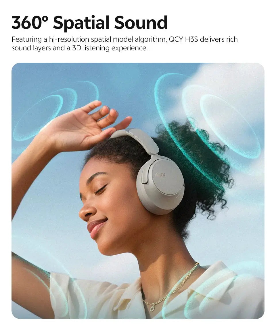 QCY H3S over-ear headphones in light gray with wireless Bluetooth.