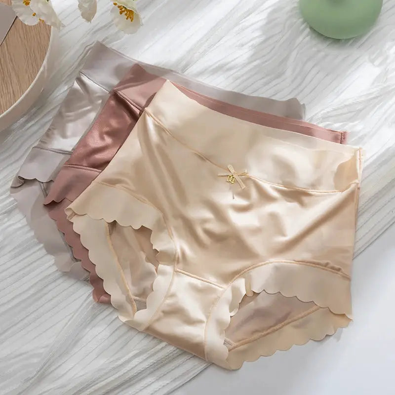 Silk panties trio: beige, blush, and gray mid-rise briefs with scalloped edges and small bow