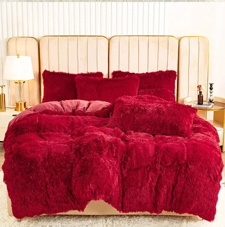 3-Piece Plush Duvet Cover Set in deep red with fluffy, soft bedding on a beige upholstered bed