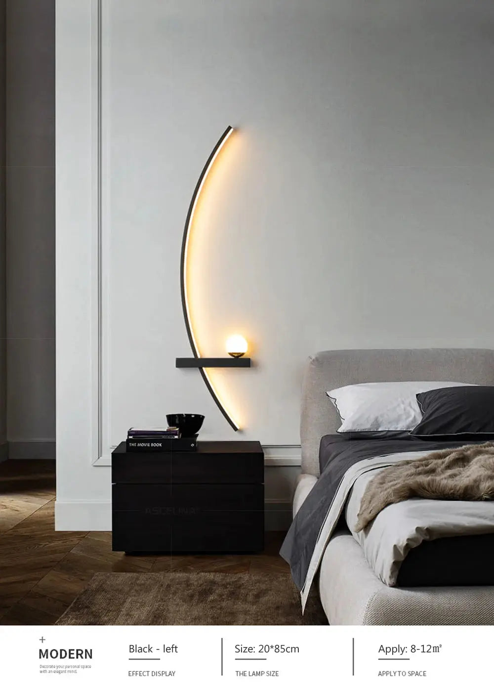 Black curved LED wall lamp with warm edge lighting and a small bedside shelf with globe bulb.