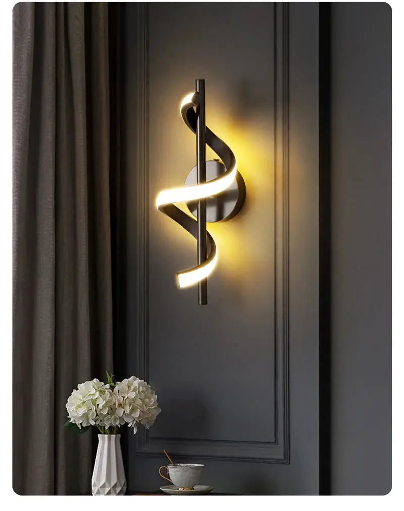 Lustre LED pendant light wall-mounted with a twisting spiral ribbon design, warm white glow, modern metal fixture