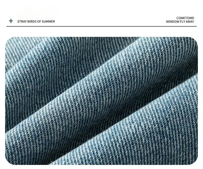 Baggy denim shorts blue denim fabric close-up texture showing tight weave.