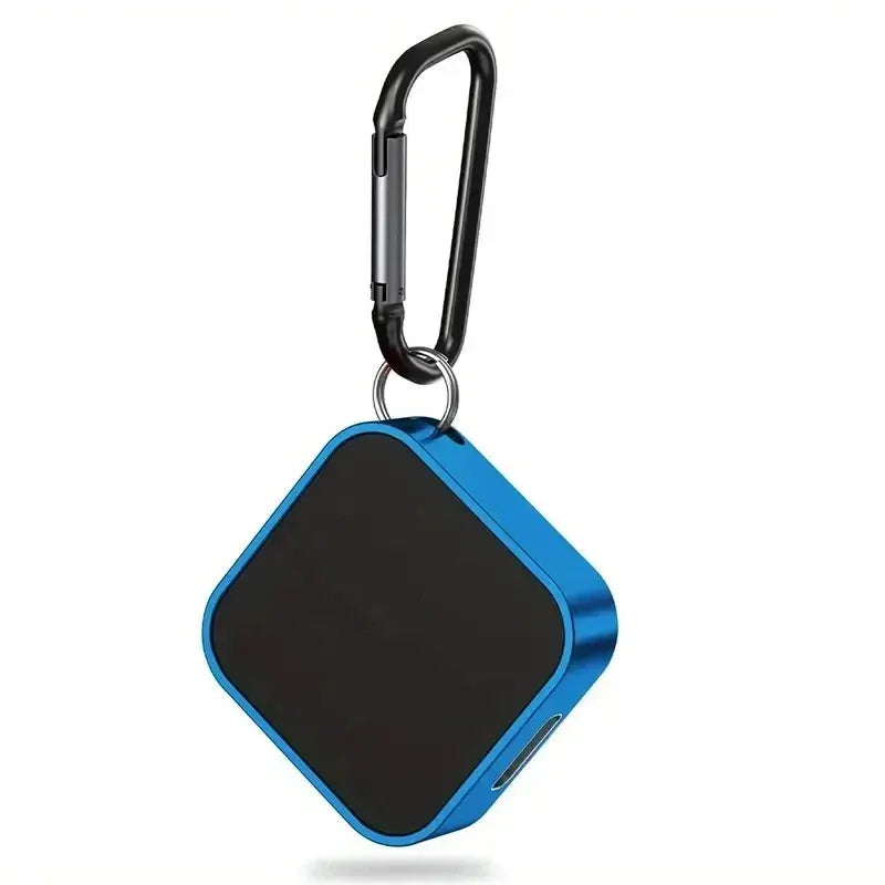 Portable blue aluminum watch charger with black charging pad and carabiner clip