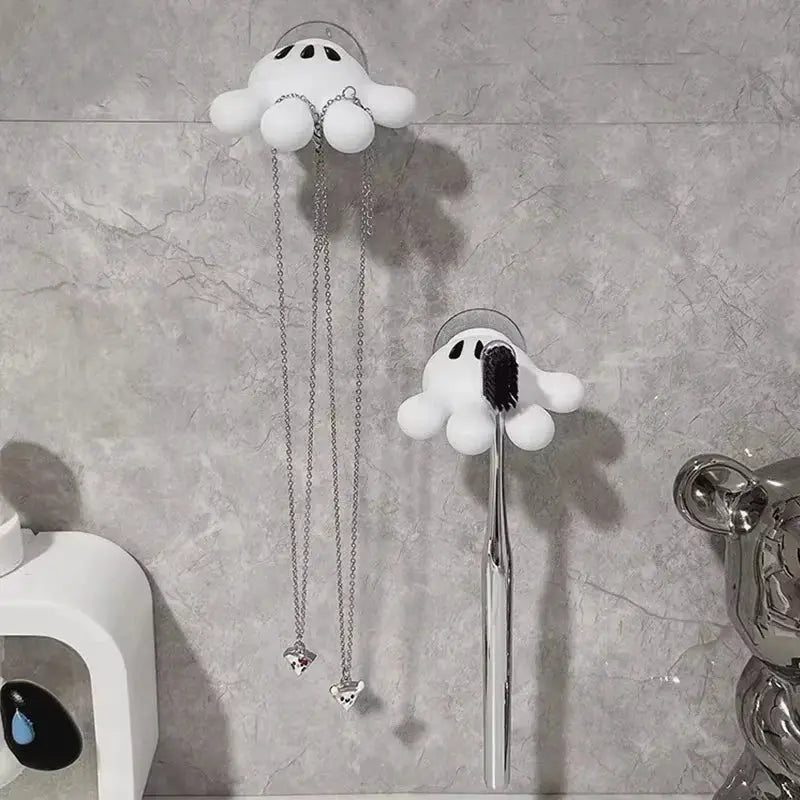Two white cloud-shaped bathroom suction hooks with chains and crystal pendants