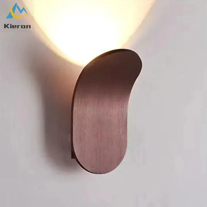 Nordic Modern Skateboard LED Wall Lamp with a curved wooden panel in brushed copper finish