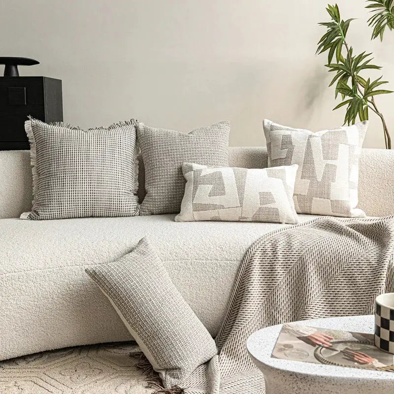 Ivory Black Rust Red Pillows; five decorative cushions with neutral gray textures for sofa decor.