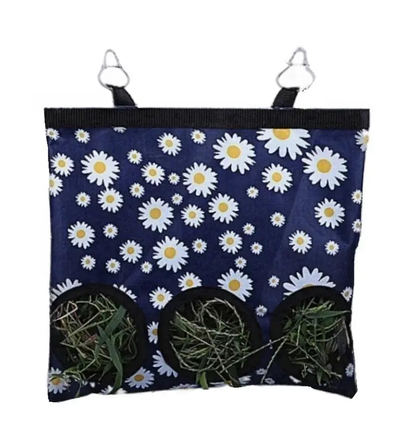 Rabbit Hay Bag by Simples Market, blue daisy-pattern hanging hay feeder with 3 holes.