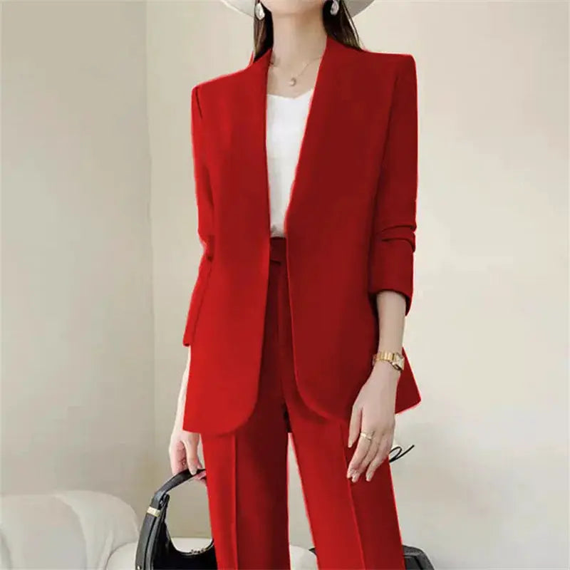 Red women's 2-piece pantsuit with blazer and matching trousers, white top visible, chic commuter office outfit