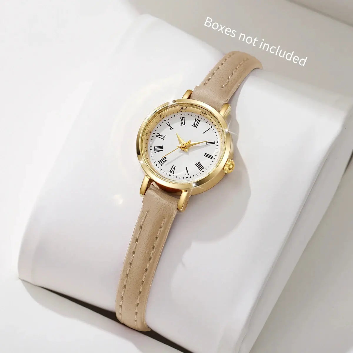Womens leather-band quartz watch with beige strap, gold-tone case, Roman numeral dial