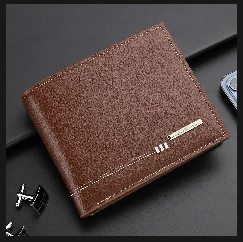 Men's brown lychee-textured leather wallet with white stitching and metal logo plaque.