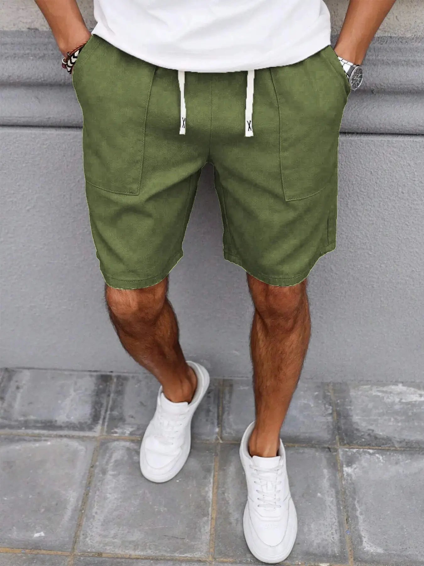 Men's olive green drawstring shorts, mid-length casual style with front pockets
