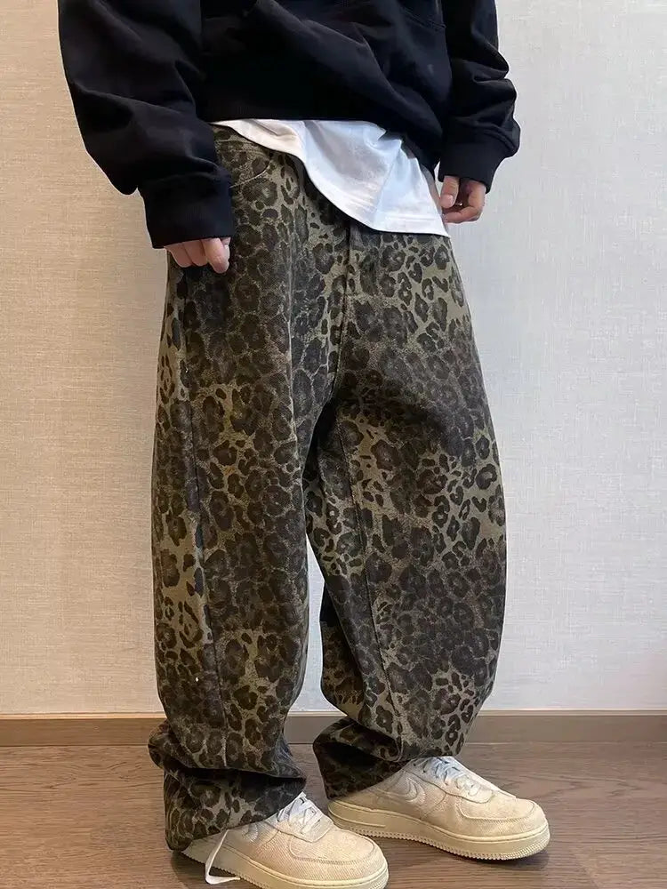 Men's leopard print denim jeans, oversized wide-leg streetwear pants in autumn tan.