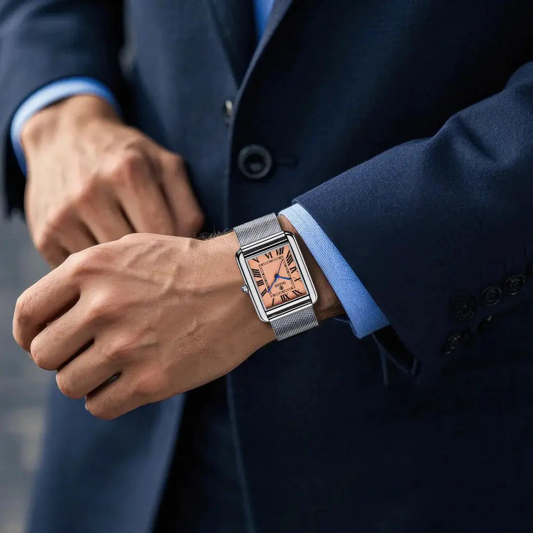 OGEDA waterproof couple watch with square peach dial, Roman numerals, blue hands, stainless steel mesh strap