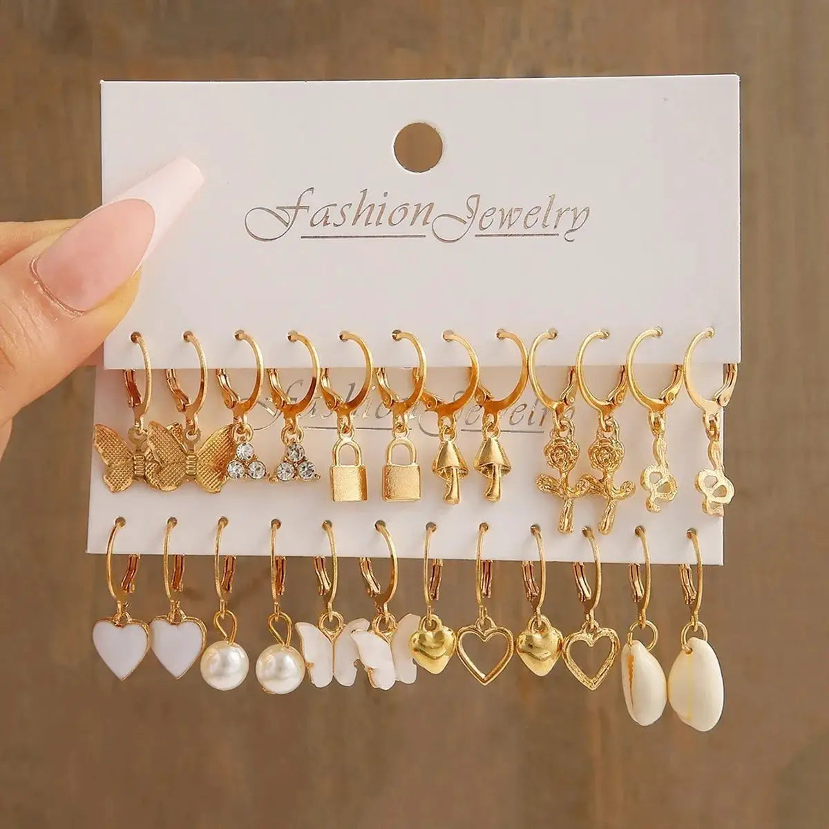 European And American Metal Earrings 24 Piece Set Featuring Pearls Mushrooms Snakes Butterflies And More Fashion Jewelry
