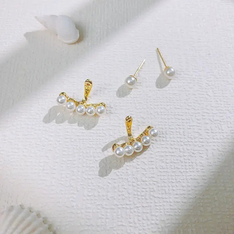 Simples Market pearl earrings set: gold-tone crescent designs with white pearls and pearl stud earrings