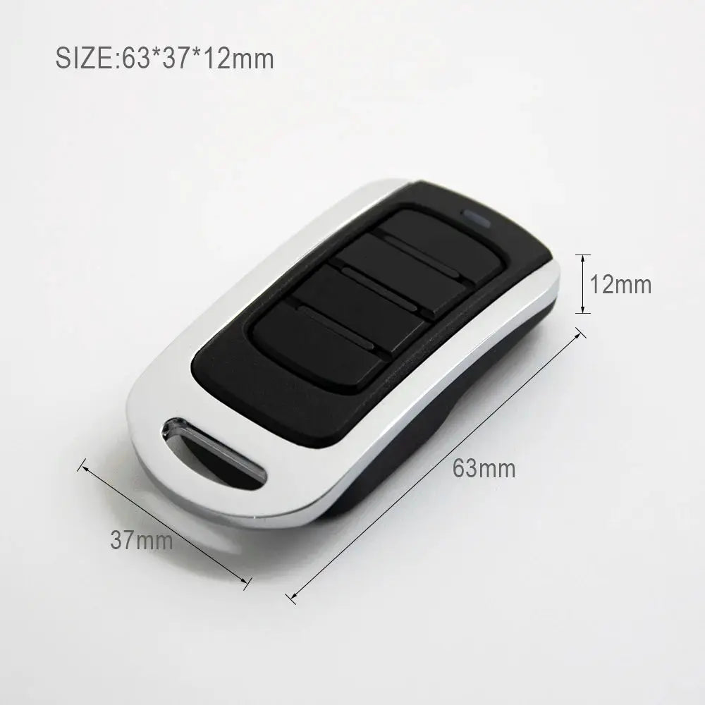 Simples Market 4-in-1 garage remote key fob, white outer shell with black center, 63×37×12mm