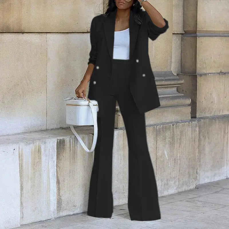 Two-piece women's black blazer and straight-leg pants suit; double-breasted blazer for a business casual office look