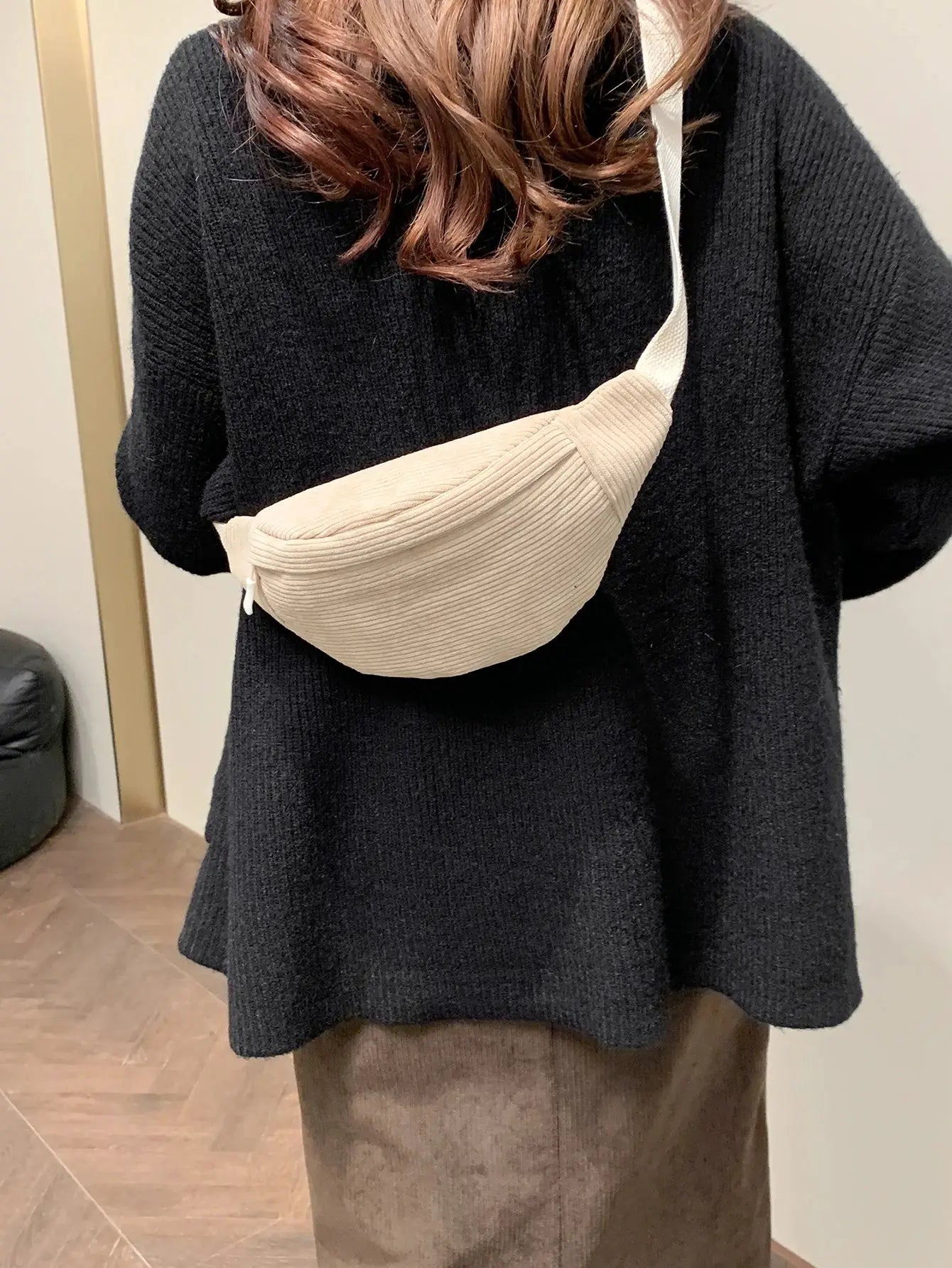 Simples Market beige corduroy fanny pack worn crossbody with white strap