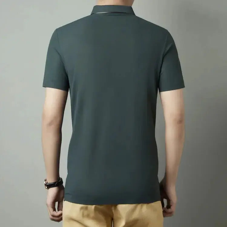 Men's polo shirt back view in dark teal with short sleeves and collar