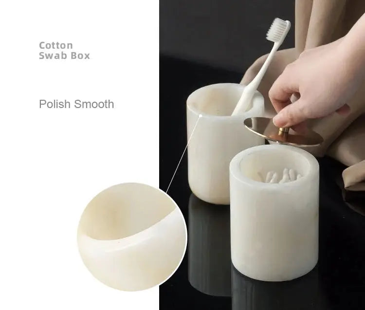 Three-piece white onyx marble bathroom accessories set with soap dispenser, tissue box, vanity tray