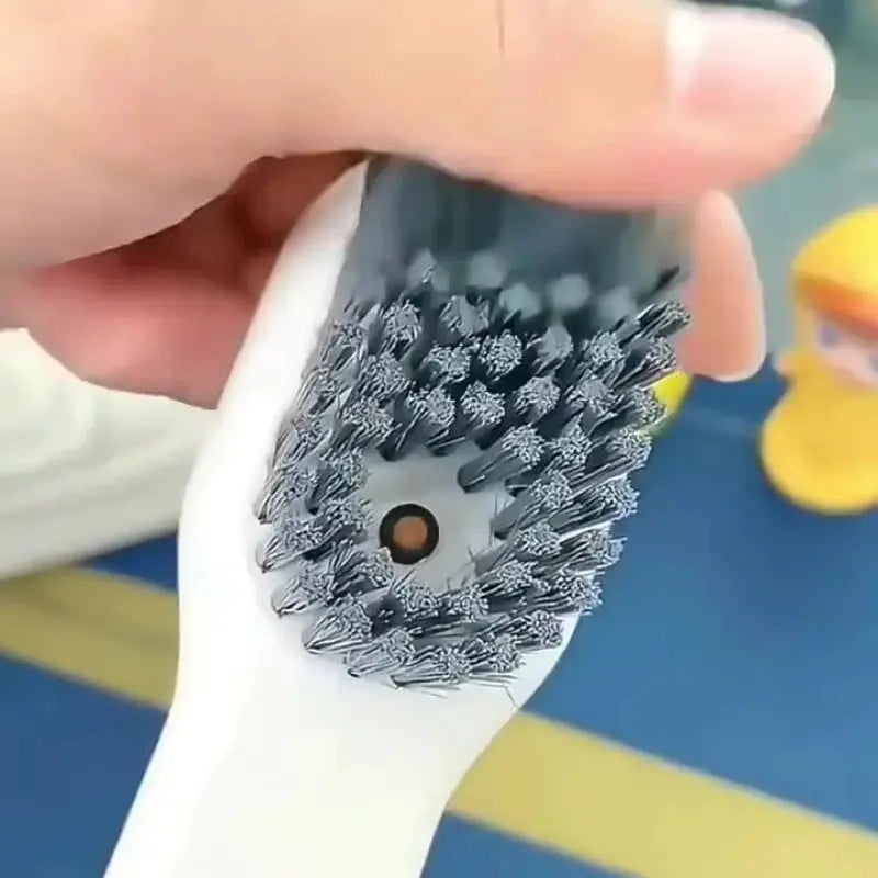 Simples Market shoes cleaning brush with white handle and round head of dense soft gray bristles