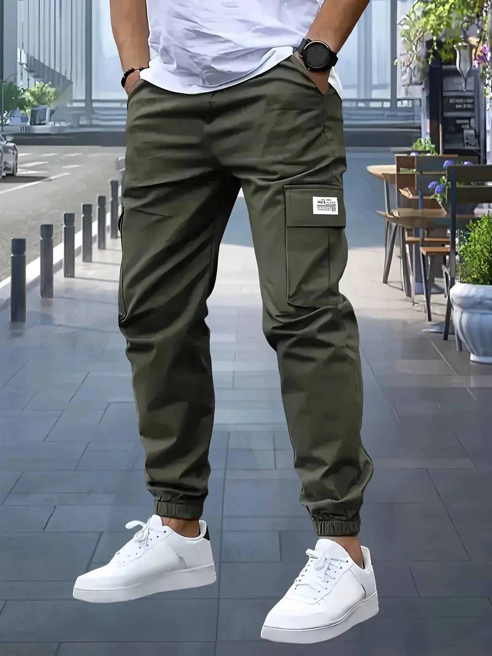 Men's olive green cargo pants with multi-pocket design by Simples Market