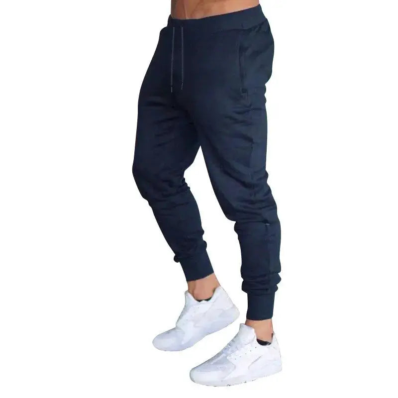 Jogger pants, navy breathable fabric with drawstring waist and cuffed ankles