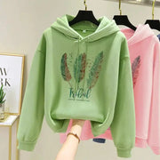 CozyNest Feather Print Hoodie With Velvet Lined Comfort For Women In Autumn And Winter Loose Fit