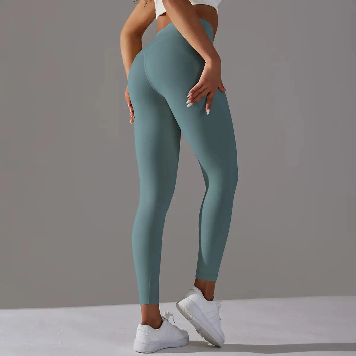 High waist Naked Feeling leggings for women in teal, gym and yoga workout pants.