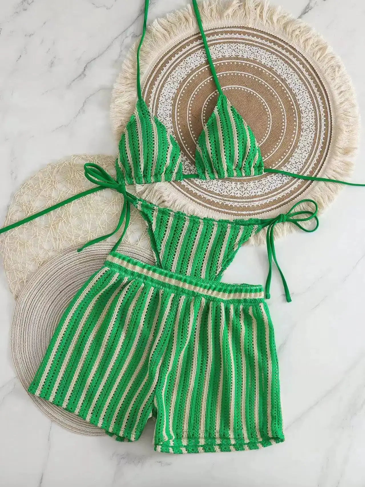 Bikini set: green striped mesh top with lace-up neck ties and matching high-waisted bottom; two-piece swimsuit