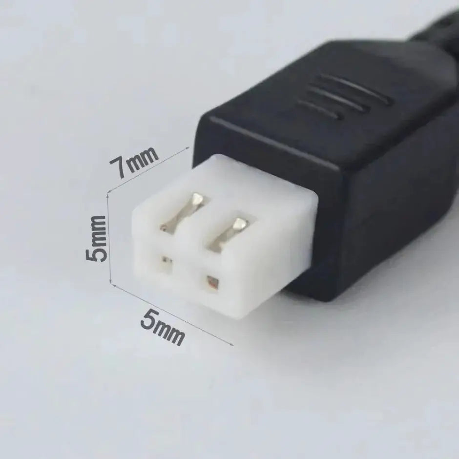 White ultrasonic parking sensor plug on a black housing, compact automotive radar system component